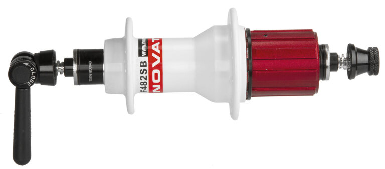 Moyeu arrière / 130 MM / Axe tombant / Frein sur jante / 24GTS / Novatec / F482SB-11S / HG Body 36,85 MM / Blanc / Race