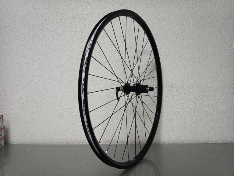 Rear wheel / 622X21C / Rigida - Ryde / ZAC 421 / Black / Shimano / FH-M8000 Deore XT / HG Body 35 MM / 135 MM / Disc (Centerlock) / MTB - Tour