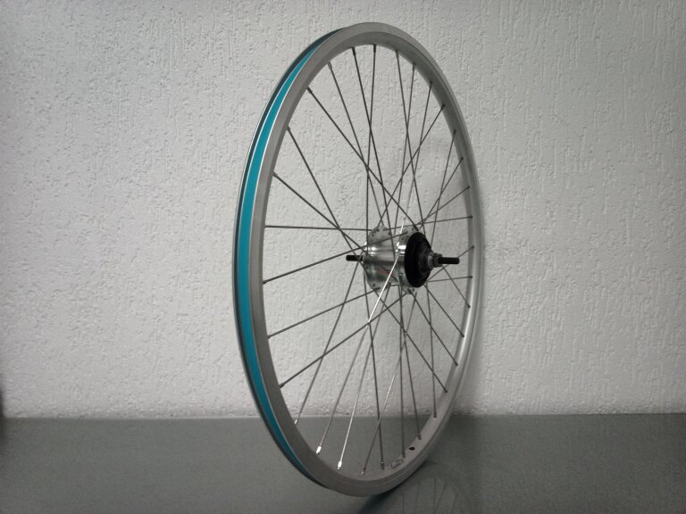 Roue arrière / 622X19C / Rigida - Ryde / Andra 10 / Silver / Shimano / Nexus Inter 7 SG-C3001-7R / 7S / 127 MM / Frein à rouleaux ou Frein sur jante / City