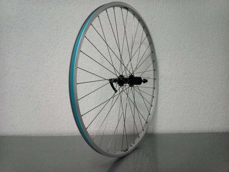 Roue arrière / 622X19C / Rigida - Ryde / ZAC 19 / Silver / Blaps / R19R36 / HG Body 35 MM / 135 MM / Frein sur jante / Tour