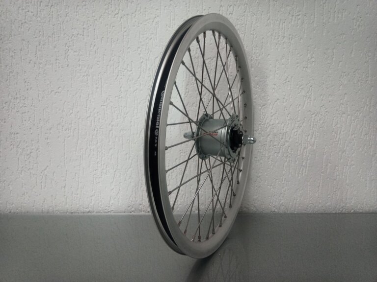 Roue avant / 406X19C / Rigida - Ryde / X-Plorer / Argent / Shimano / DH-C6000-3R-N 6V-3.0W Dynamo / / 100 MM / Frein à rouleaux / Cargo