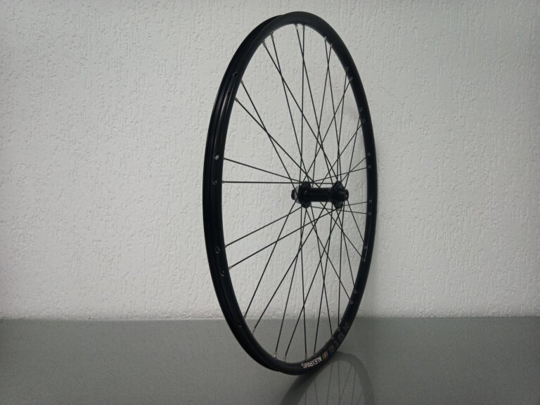 Vorderrad / 622X20C / Alexrims / MD19 / Schwarz / Shimano / HB-MT400-B /  / 110 MM / Disc (Centerlock) / MTB - Tour