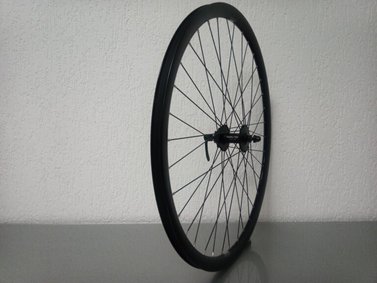 Front wheel / 622X19C / Rigida - Ryde / Dutch 19 / Black / Shimano / HB-M475 Deore /  / 100 MM / Disc (6 bolts) / Tour