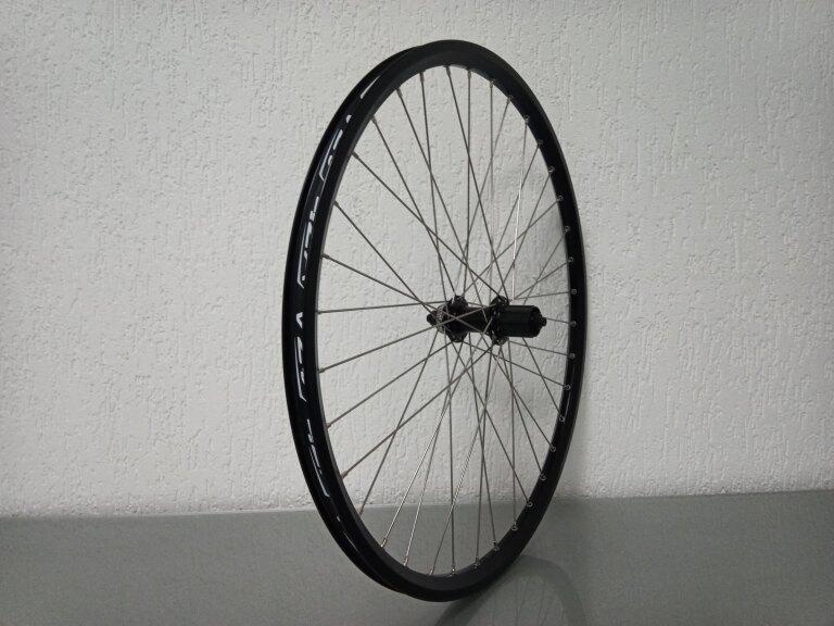 USED Rear wheel / 559X19C / Rigida - Ryde / ZAC 2000 / Black / Shimano / FH-TX505 Tourney / HG Body 35 MM / 135 MM / Disc (Centerlock) / MTB - Tour