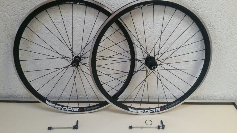 Wielset / 622X18C / Rigida - Ryde / DP18 Speed / Zwart / Novatec / F482SB-11S / HG Body 36,85 MM / 130 MM / Velgrem / Race