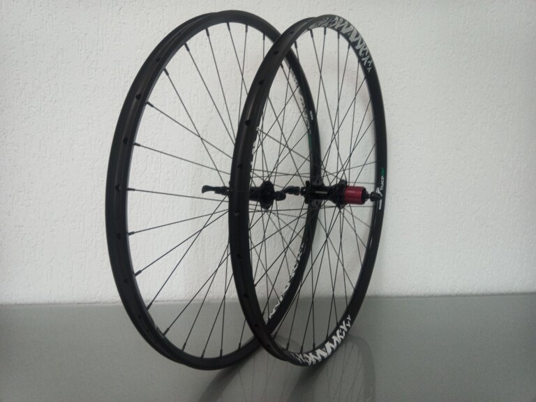 Wielset / 622X25C / Rigida - Ryde / Trace 25mm / Zwart / Novatec / D792SB/A-AA-11S / HG Body 36,85 MM / 135 MM / Disc (6 bout) / MTB