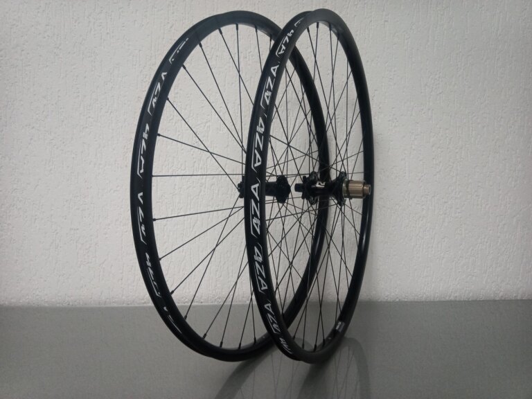 Wielset / 622X21C / Rigida - Ryde / Andra 321 / Zwart / Novatec / D462SB-A5A-B12 / HG Body 36,85 MM / 148 MM / Disc (6 bout) / MTB