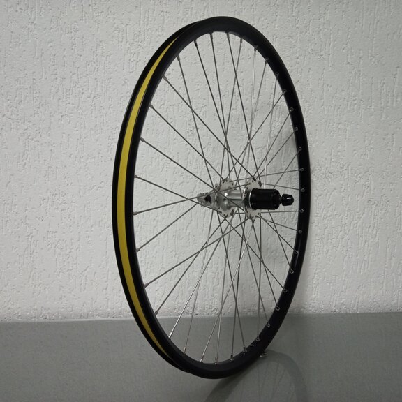 Roue arrière / 559X21C / Rigida - Ryde / Taurus / Noir / Shimano / FH-C501 Nexave / HG Body 35 MM / 135 MM / Disque (6 boulons) / VTT - Tour 