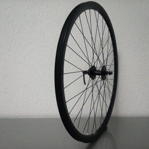 Front wheel / 622X19C / Rigida - Ryde / Dutch 19 / Black / Shimano / HB-M475 Deore /  / 100 MM / Disc (6 bolts) / Tour 