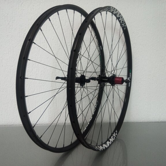 Wielset / 622X25C / Rigida - Ryde / Trace 25mm / Zwart / Novatec / D792SB/A-AA-11S / HG Body 36,85 MM / 135 MM / Disc (6 bout) / MTB 