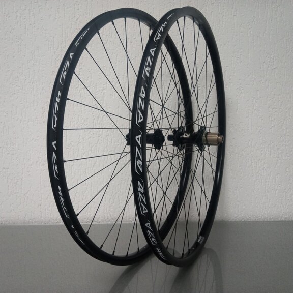 Wielset / 622X21C / Rigida - Ryde / Andra 321 / Zwart / Novatec / D462SB-A5A-B12 / HG Body 36,85 MM / 148 MM / Disc (6 bout) / MTB 