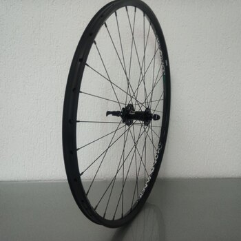 Front wheel / 622X25C / Rigida - Ryde / Trace 25mm / Black / Novatec / D791SB/A /  / 100 MM / Disc (6 bolts) / MTB