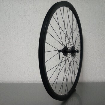 Front wheel / 622X19C / Rigida - Ryde / Dutch 19 / Black / Shimano / HB-M475 Deore /  / 100 MM / Disc (6 bolts) / Tour