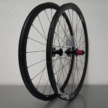 Paire de roues / 622X18C / Rigida - Ryde / DP18 Speed ​​​​Disc / Noir / Novatec / D792SB/A-AA-11S / HG Body 36,85 MM / 142 MM / Disc (6 boulons) / Race